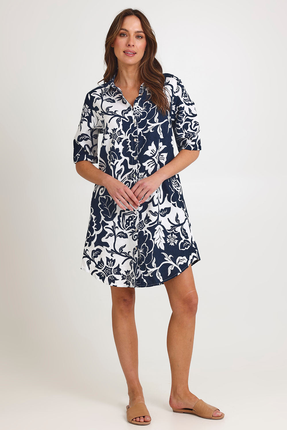 Model Madeline wearing size 10 of the Vine Linen Shirtmaker Dress in colour Vine (Blue), from the front, showing the whole outfit