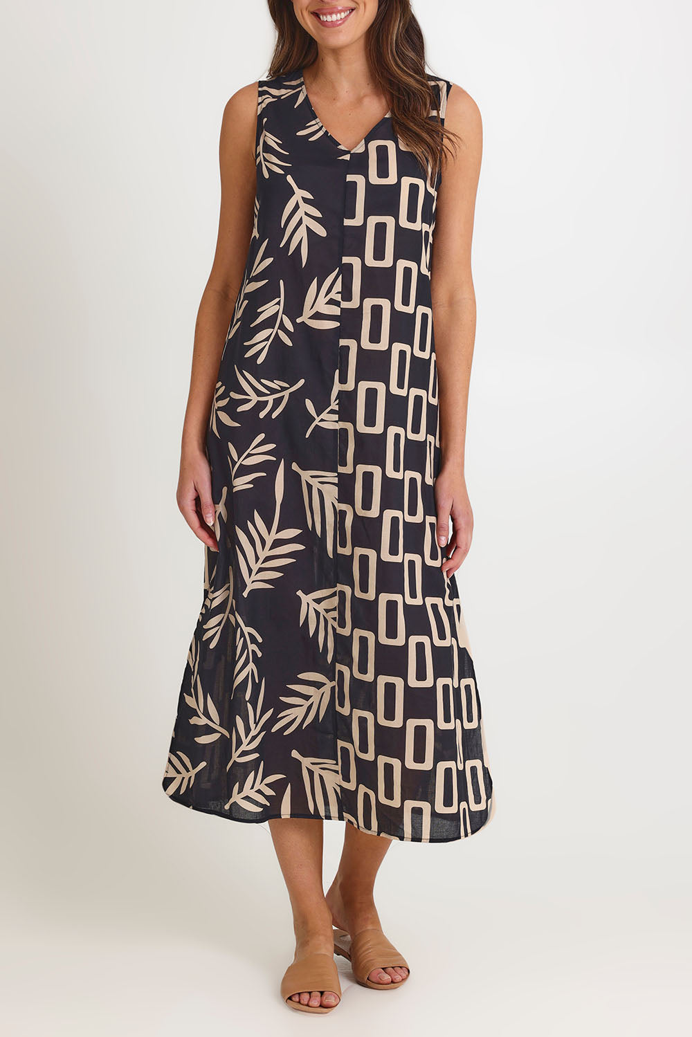 Model Madeline wearing size 10 of the Spliced Cotton Maxi Dress in colour Leaf (Black), from the front, cropped image