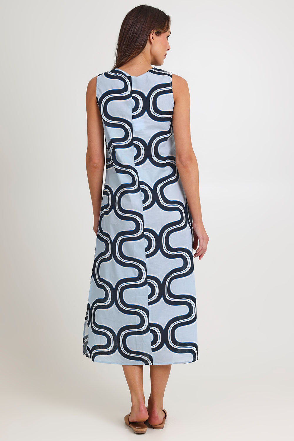 Model Madeline wearing size 10 of the Spliced Cotton Maxi Dress in colour Navy (Blue), from the back