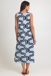 Model Madeline wearing size 10 of the Spliced Cotton Maxi Dress in colour Navy (Blue), from the back