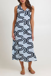 Model Madeline wearing size 10 of the Spliced Cotton Maxi Dress in colour Navy (Blue), from the front, cropped image