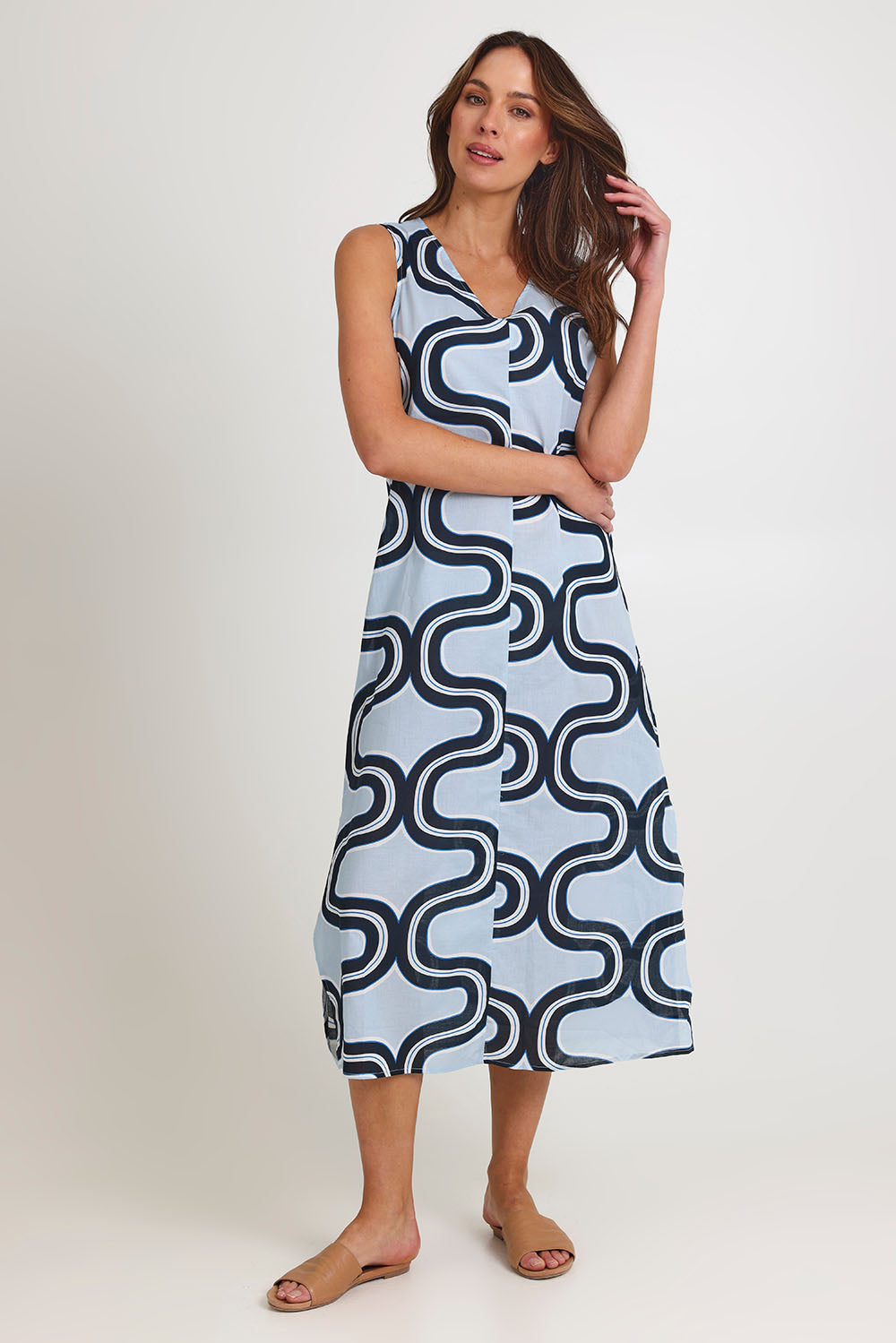 Model Madeline wearing size 10 of the Spliced Cotton Maxi Dress in colour Navy (Blue), from the front, showing the whole outfit
