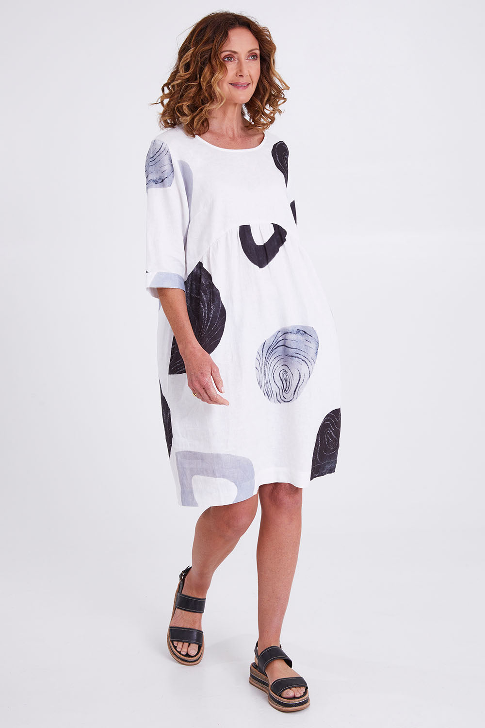 Model Emma wearing size 10 of the Linen 3/4 Sleeve Dress in colour Achromatic (White), from the front, showing the whole outfit