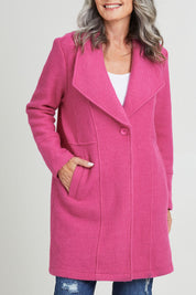 Model Luisa wearing size S of the 1 Button Collared Coat in colour Pink (Pink), from the front, cropped image