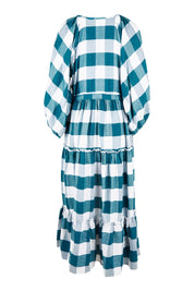 Product shot of the Wing And A Prayer Maxi Dress in colour Bluecheck (Blue), from the back