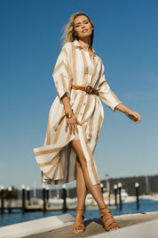 Model Phoebe wearing size OneSize of the Giorgio Coat Dress in colour Fezstripe (White), from the front, showing the whole outfit