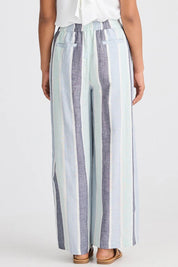 A model wearing the Positano Linen Cotton Pant in colour Tulipstrip (Blue), from the back