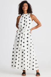 A model wearing the Lucia Linen Cotton Dress in colour Wovenspot (White), from the front, showing the whole outfit