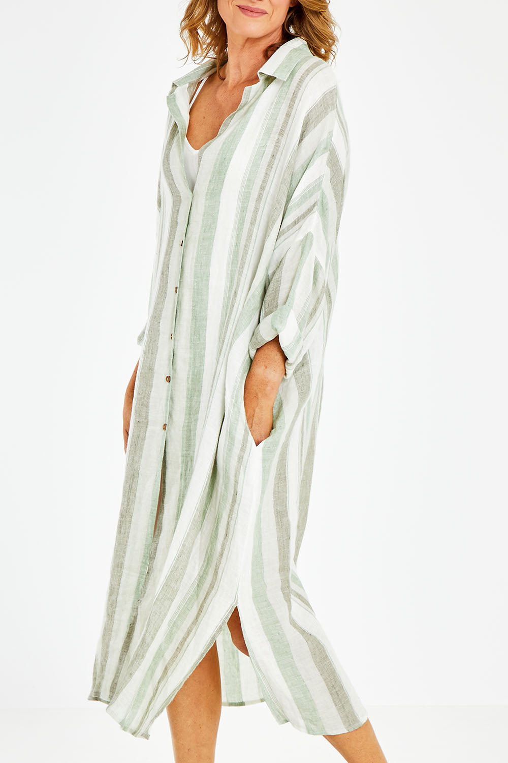Model Naomi wearing size OneSize of the Giorgio Coat Dress in colour Giardstri, from the front, cropped image