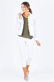 Model Madeline wearing size S of the Monza Jacket in colour White (White), from the front, showing the whole outfit