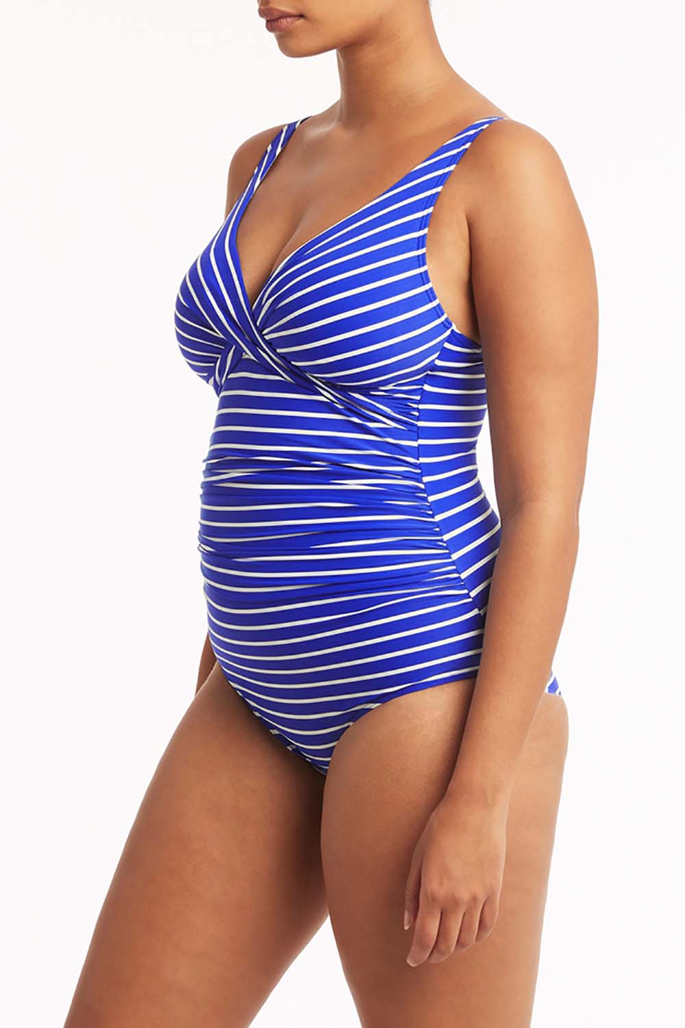 A model wearing the Chamarel Cross Front Multifit One Piece in colour Cobalt (Blue), from the front, cropped image