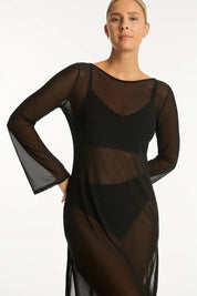 A model wearing the Mesh Reversible Long Dress in colour Black (Black), from the front, cropped image