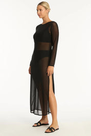A model wearing the Mesh Reversible Long Dress in colour Black (Black), from the front, showing the whole outfit
