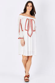 Model Georgia wearing size S of the Biba Ots Dress in colour White (White), from the front, showing the whole outfit