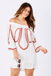 Model Laura wearing size M of the Biba Ots Dress in colour White (White), from the front, cropped image