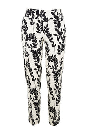 Product shot of the Ankle Pull On Pants With Pockets in colour Floral (Black), from the front