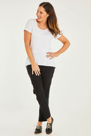 Model Georgia wearing size 10 of the Ankle Pull On Pants With Pockets in colour Black (Black), from the front, showing the whole outfit