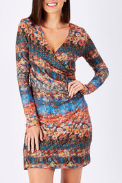 Model Perrie wearing the Avelina Dress in colour Darkorange, from the front, cropped image