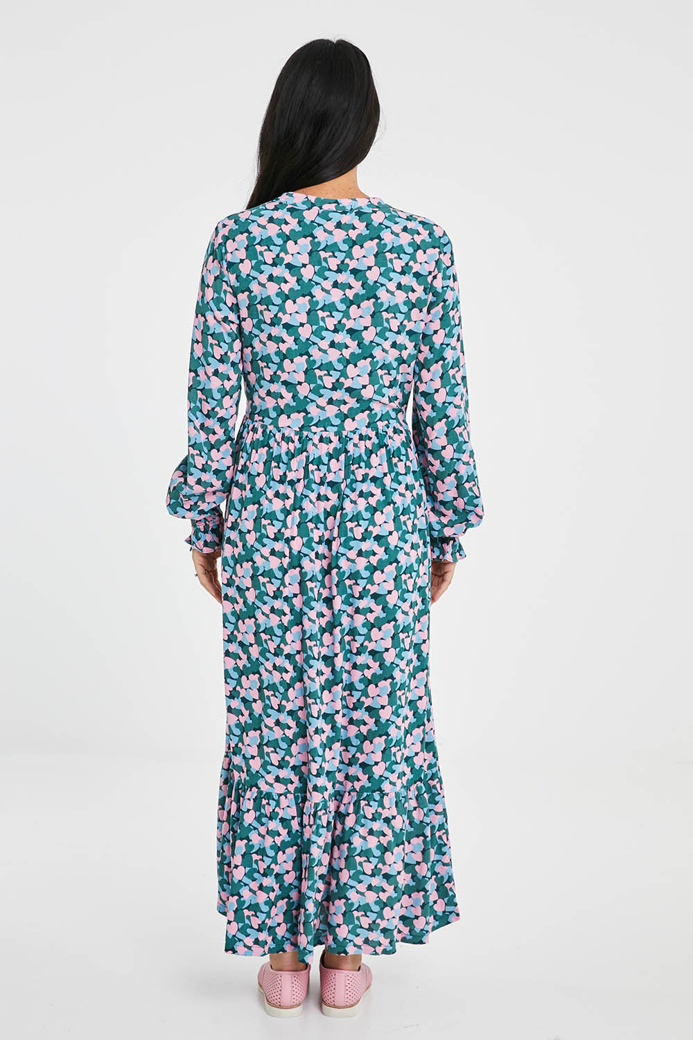 Model Katie wearing size 10 of the Elise Maxi Smock Dress in colour Multi (Blue), from the back