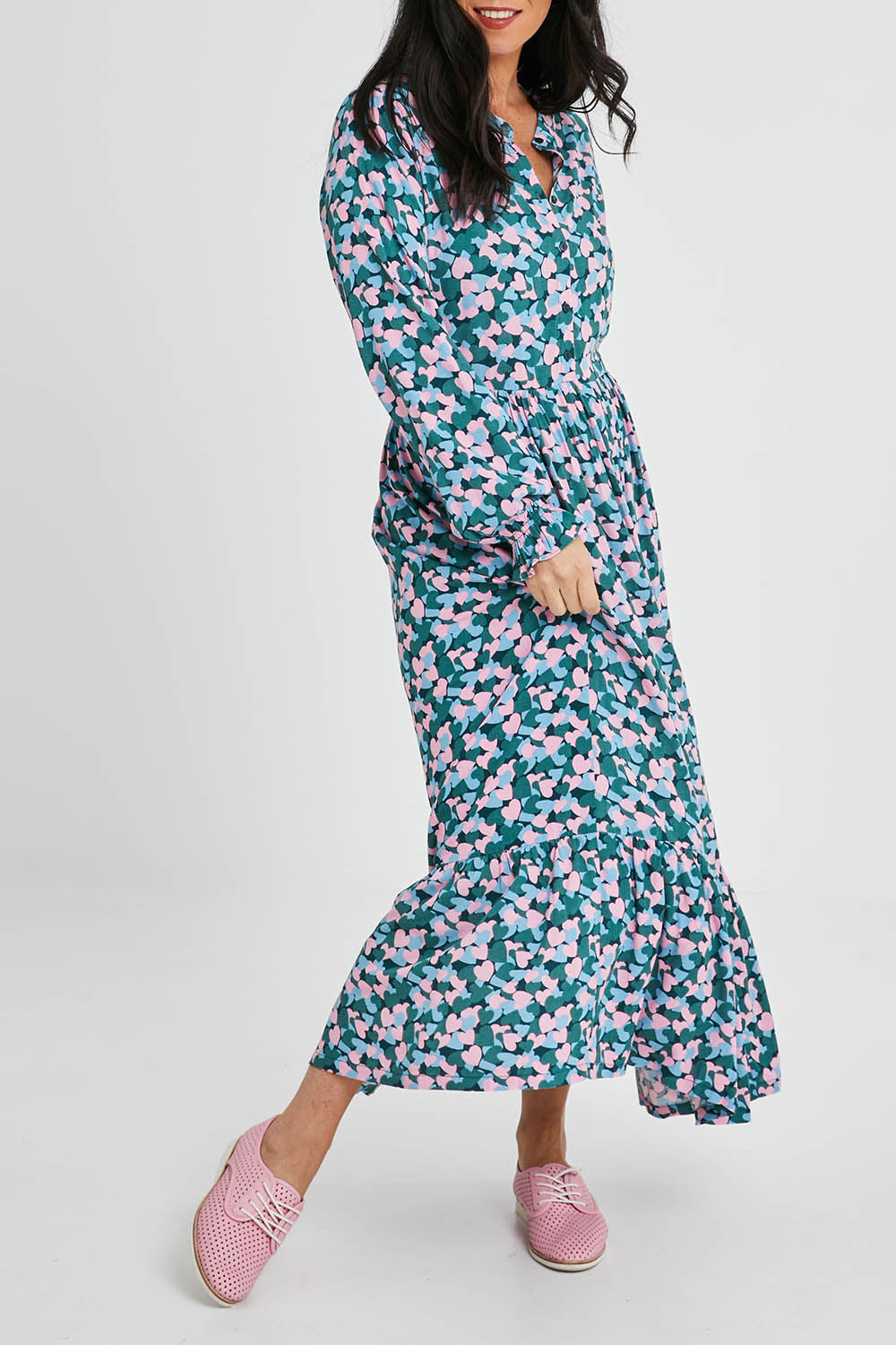 Model Katie wearing size 10 of the Elise Maxi Smock Dress in colour Multi (Blue), from the front, cropped image