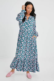 Model Katie wearing size 10 of the Elise Maxi Smock Dress in colour Multi (Blue), from the front, showing the whole outfit