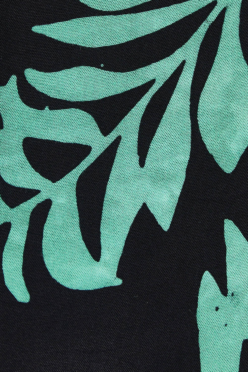 Product shot of the Casey Batik Top in colour Blkgreen (Black), detail