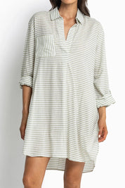 A model wearing the Summer Stripe Painters Shirt in colour Khaki (Green), from the front, cropped image
