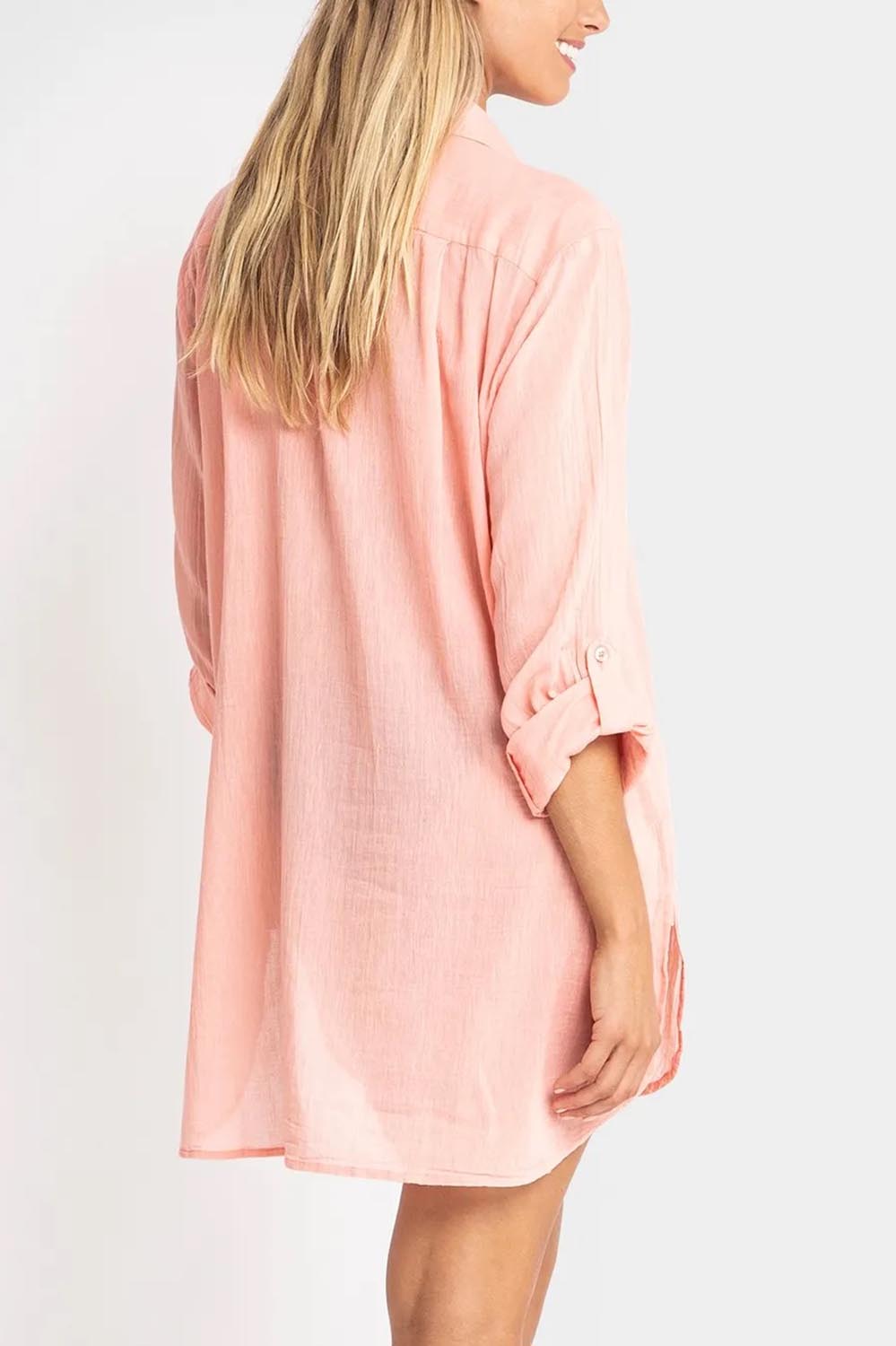 A model wearing the Resort Painters Shirt in colour Coral (Pink), from the back