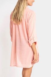 A model wearing the Resort Painters Shirt in colour Coral (Pink), from the back