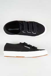 A model wearing size 36 of the 2750 Cotu Straps Sneaker in colour Black (Black), from the front, showing the whole outfit