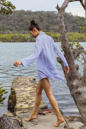 A model wearing the Summer Stripe Painters Shirt in colour Blue (Blue), from the front, showing the whole outfit