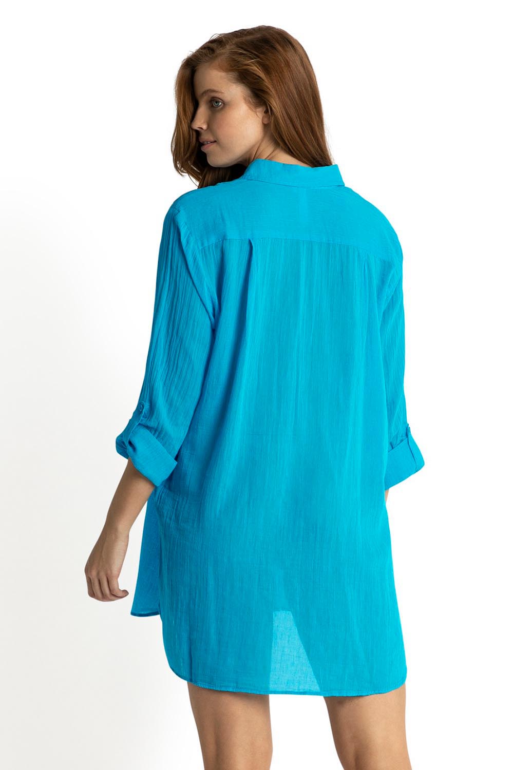 A model wearing the Resort Painters Shirt in colour Teal (Blue), from the back