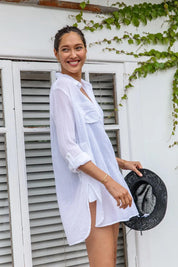 A model wearing the Resort Painters Shirt in colour White (White), from the front, showing the whole outfit