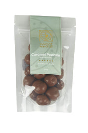 Product shot of the 100G Milk Chocolate Caramel Popcorn in colour Chocarapop, detail