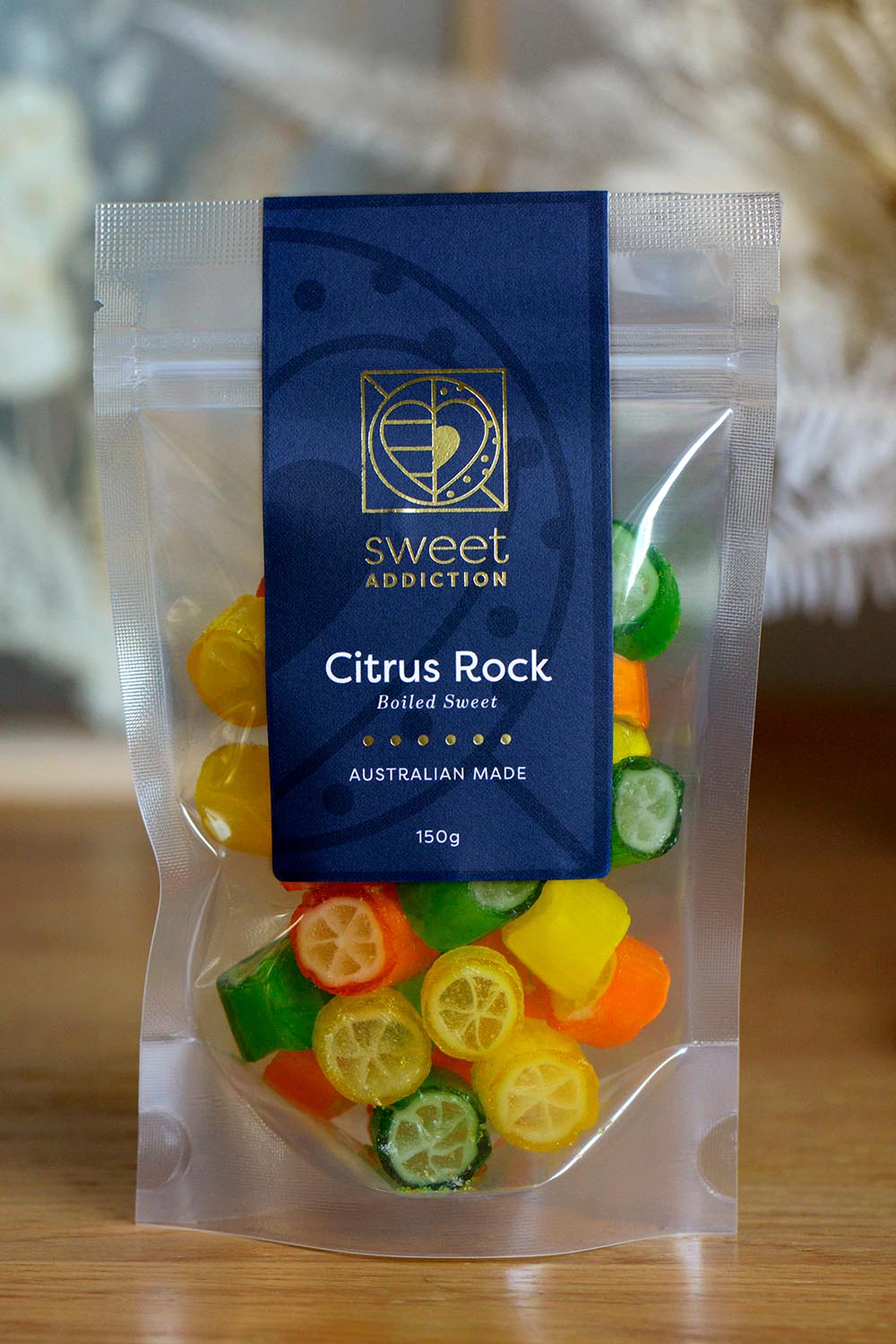 Product shot of the 150g Citrus Rock Boiled Sweet - Citrusrock in colour Citrusrock, from the front