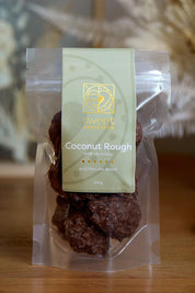 A model wearing the 120G Milk Chocolate Coconut Rough in colour Cocorough, from the front, showing the whole outfit