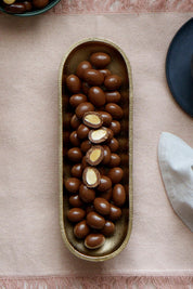 Product shot of the 150g Milk Chocolate Almonds - Milkalmonds in colour Milkalmonds, showing detail