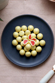 Product shot of the 150g White Chocolate Raspberries - Whiterasp in colour Whiterasp, from the front