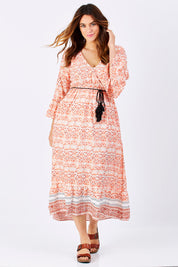 Model Laura wearing size M of the Aurora Dress in colour Wanderer, from the front, showing the whole outfit