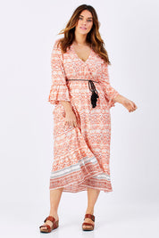 Model Laura wearing size M of the Aurora Dress in colour Wanderer, from the front, showing the whole outfit