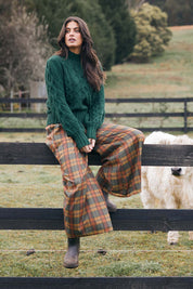 A model wearing the Freedom Pant in colour Highlands, from the front, showing the whole outfit