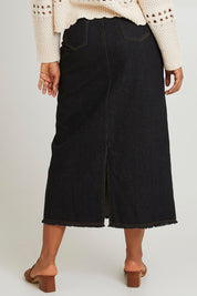 Model Olivia wearing size S of the Macey Skirt in colour Blackwash (Black), from the back