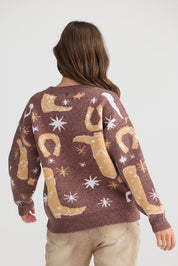 A model wearing the Lucky Boots Knit in colour Chocolate, from the back