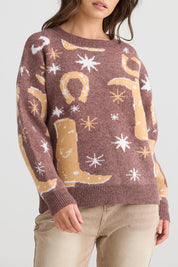 A model wearing the Lucky Boots Knit in colour Chocolate, from the front, cropped image