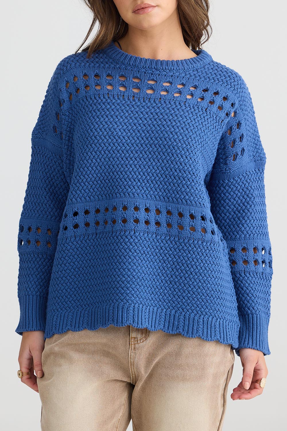 A model wearing the Tanner Cotton Blend Knit in colour Seablue (Blue), from the front, cropped image