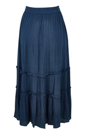Product shot of the Inhale Maxi Skirt in colour Navy (Blue), from the back