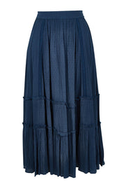Product shot of the Inhale Maxi Skirt in colour Navy (Blue), from the front
