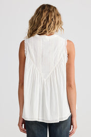 A model wearing the Sprite Cotton Sleeveless Top in colour White (White), from the back