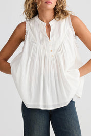 A model wearing the Sprite Cotton Sleeveless Top in colour White (White), from the front, cropped image