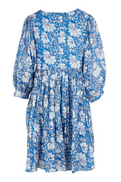 Product shot of the Wisteria Cotton Mini Dress in colour Blueblosso (Blue), from the back